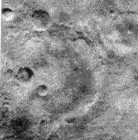 B/W Mariner 4 image of extensive impact cratering on the surface of Mars.
